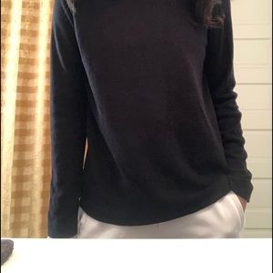 black staple turtleneck